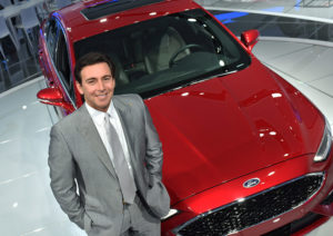 Detroit, January 12, 2016 -- Mark Fields, President, Chief Executive Officer, Ford Motor Company, with the 2017 Ford Fusion at the North American International Auto Show.